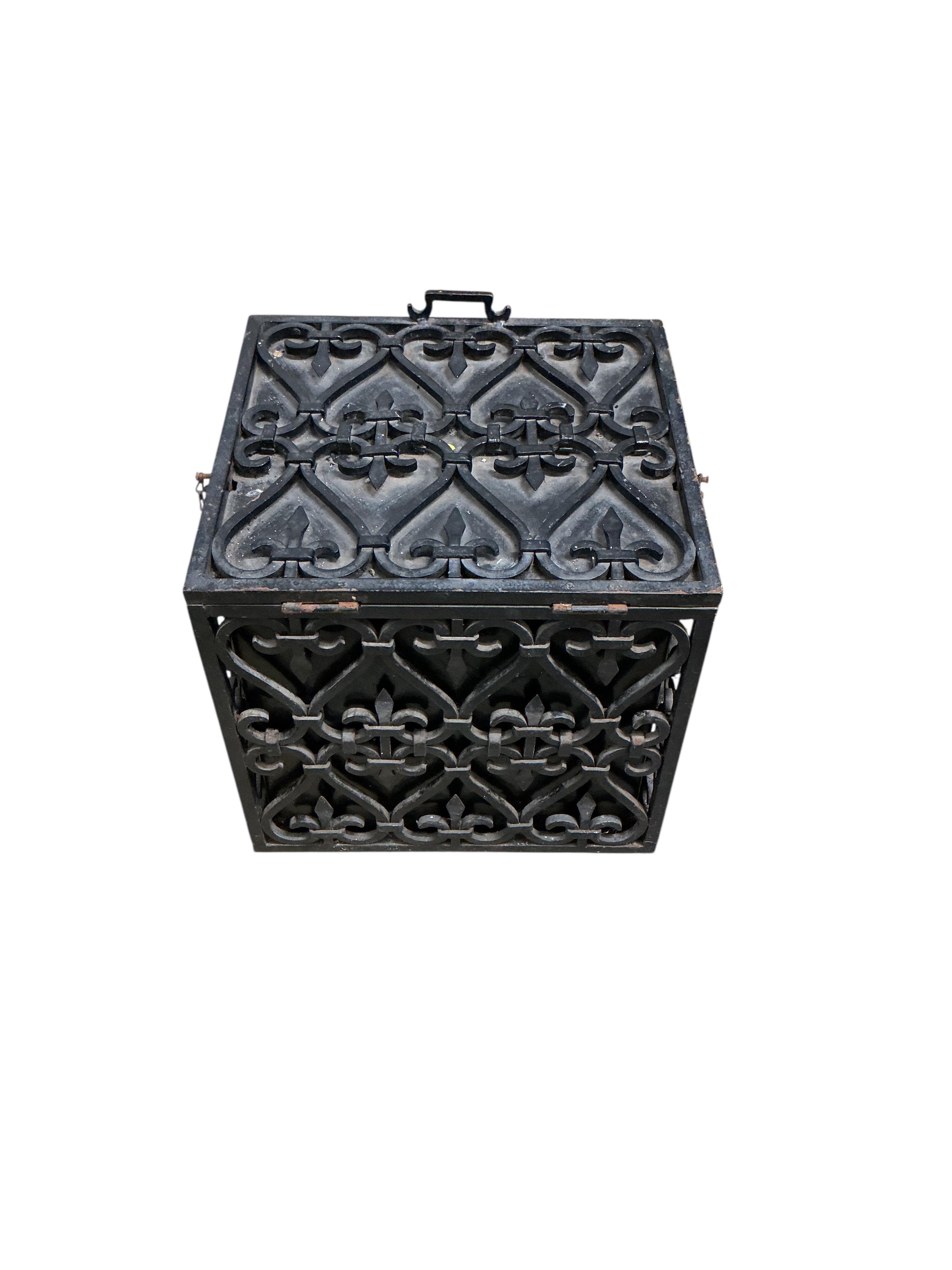 A wrought iron box with liner, width 37cm, depth 34cm, height 35cm